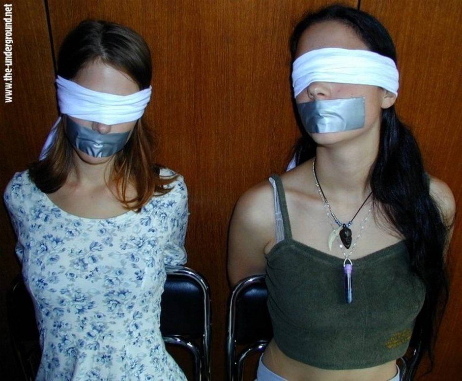 Girl with a sealed mouth BDSM