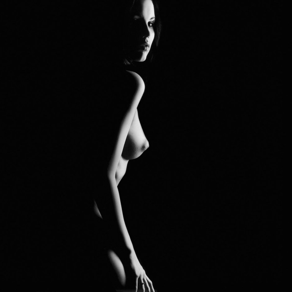 Naked girls dark background