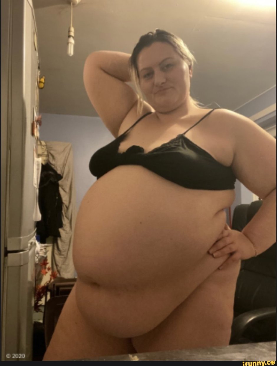 Naked fat woman with a saggy stomach