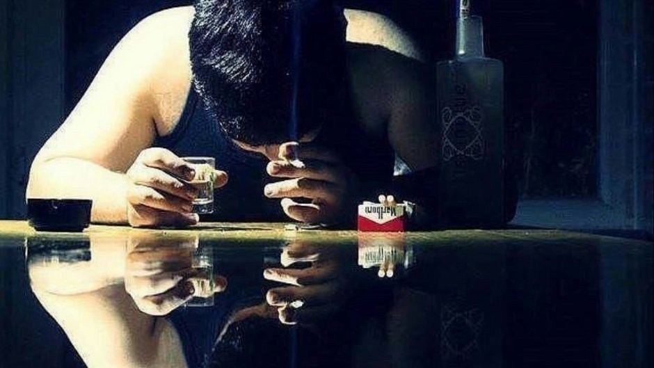 Sad guy with alcohol