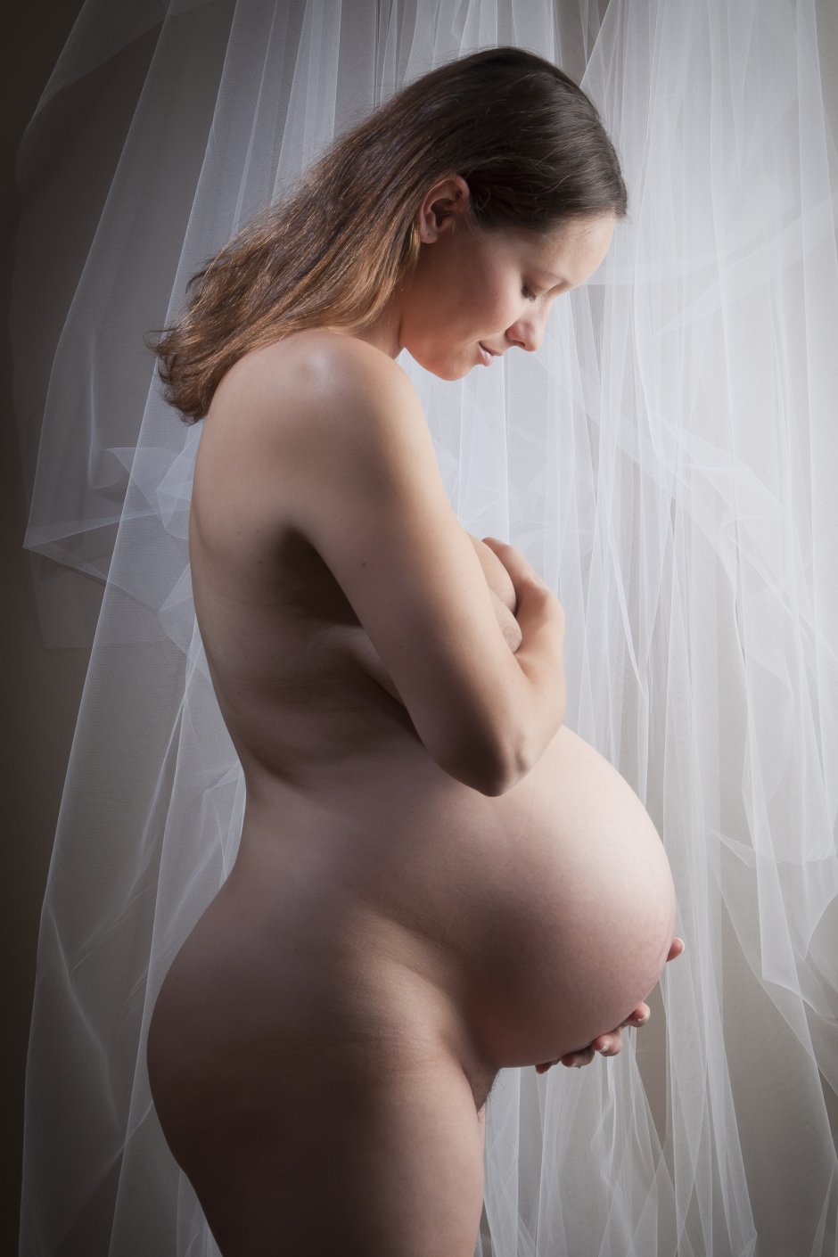 Фотосессия беременной ню