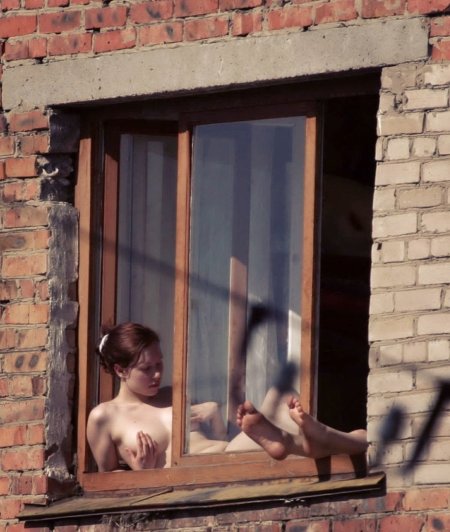Naked women in window