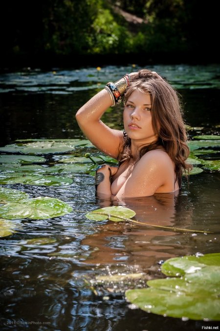 Girls on the lake in swimsuits