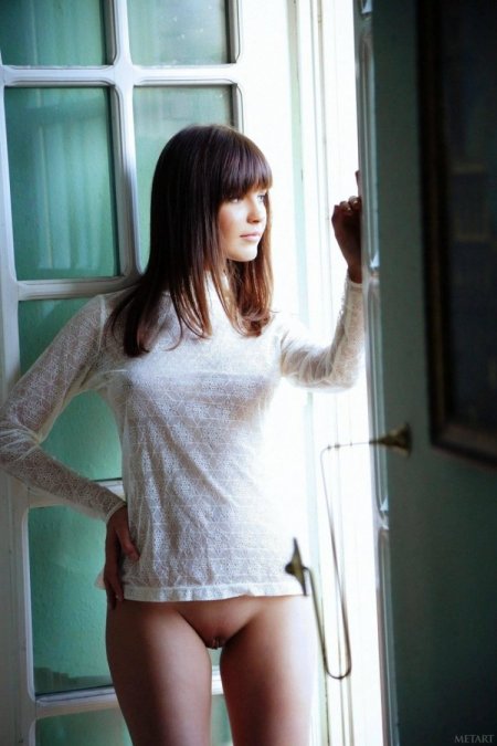 Girl in a T-shirt without panties