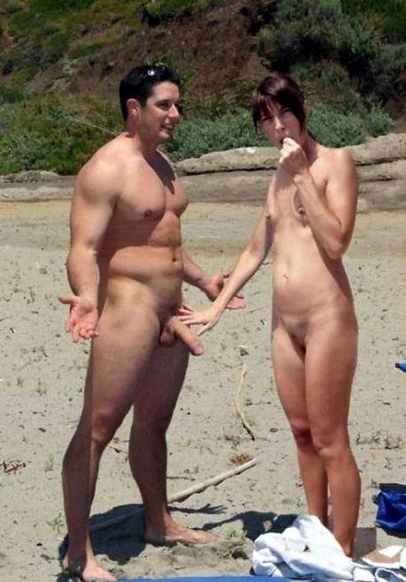 Naked men and women on the beach