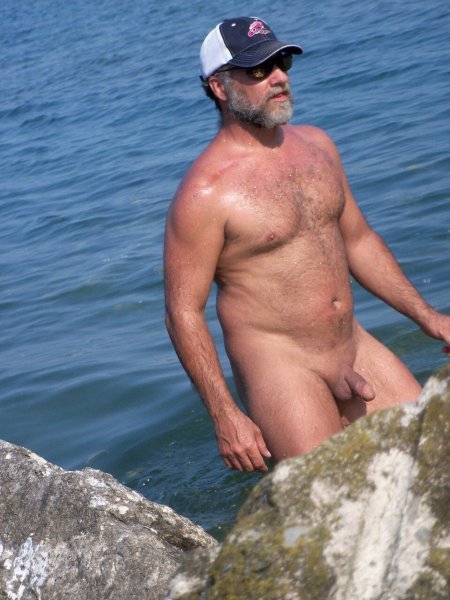 Naked men on the Nudist beach