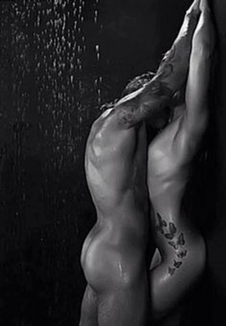 Girls topless with a man