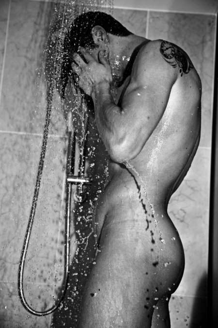 Naked guys wash in the shower