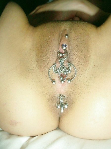 Unusual female intimate piercing