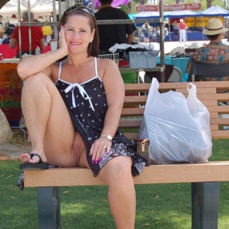 Ladies without panties under a skirt