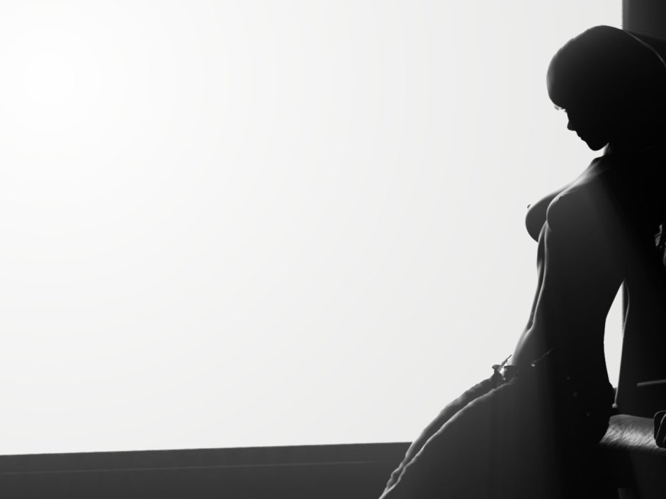 Силуэт девушки со спины в темноте