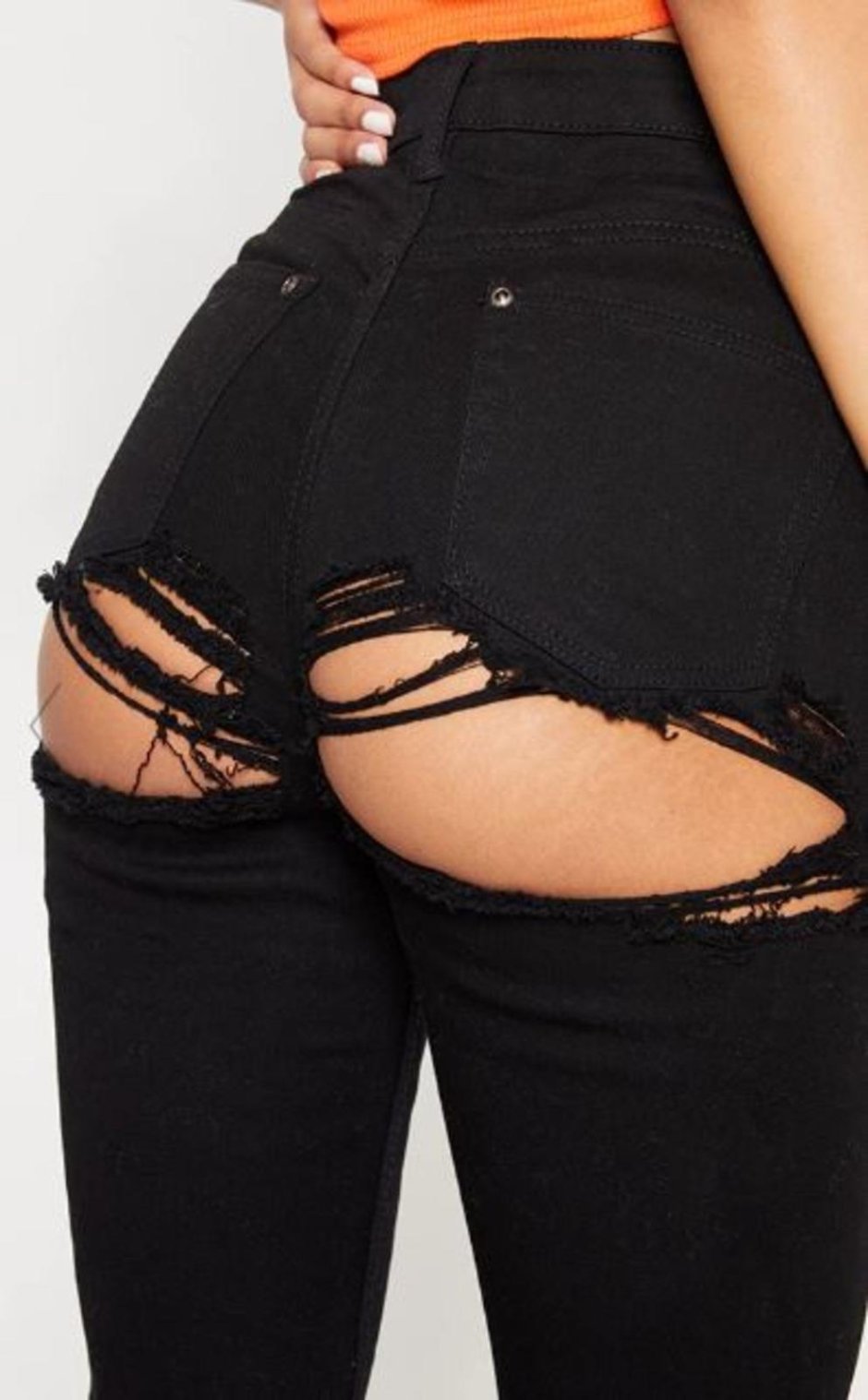 Джинсы с дырками на попе