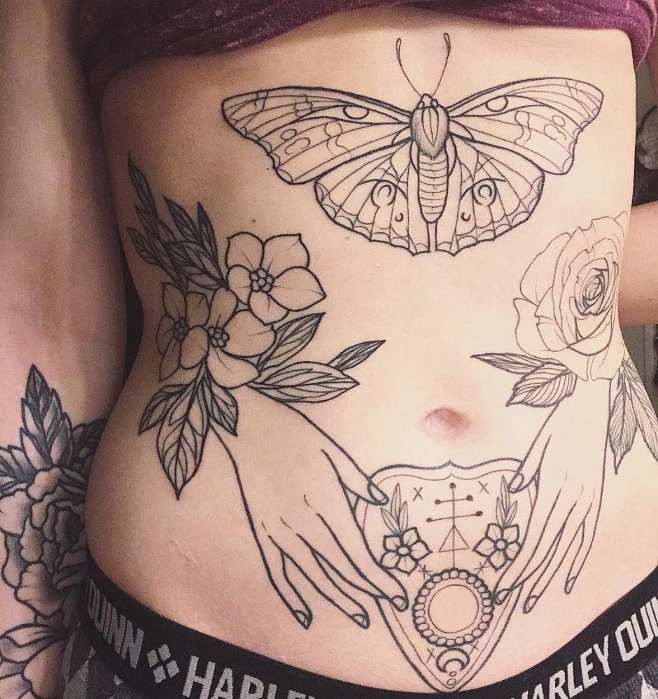 Татуировка на животе женская