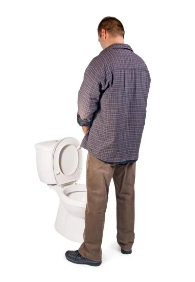 Человек на унитазе