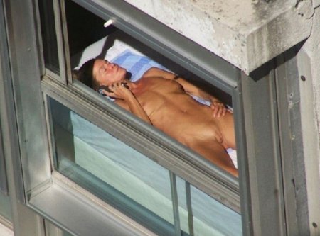 Peeping naked in the window