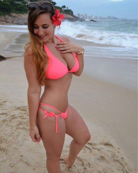 Busty woman on the beach