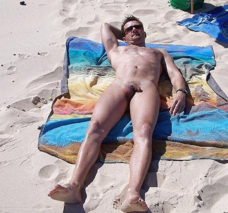 Man on a nudist beach