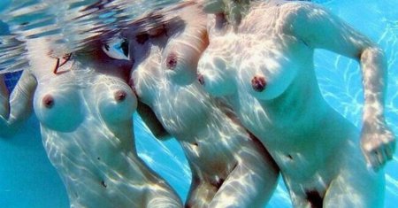Naked girls in clear water