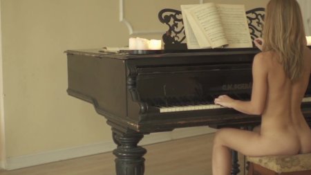 Girl plays the piano