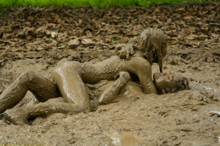 Women bathing in mud