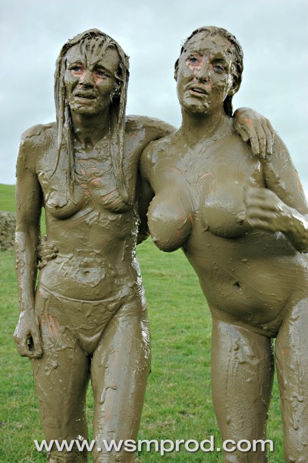 Naked girl in the mud