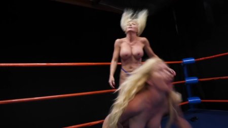 Naked women fight in the ring