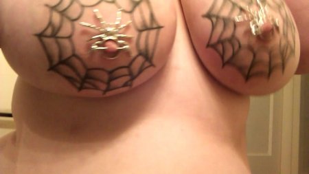 Cobweb tattoo on female breast