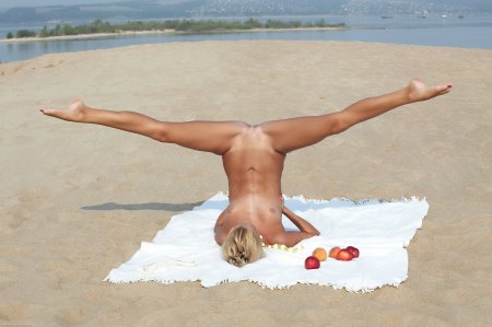 Young gymnasts naked at sea