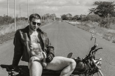 Naked guy on a motorcycle