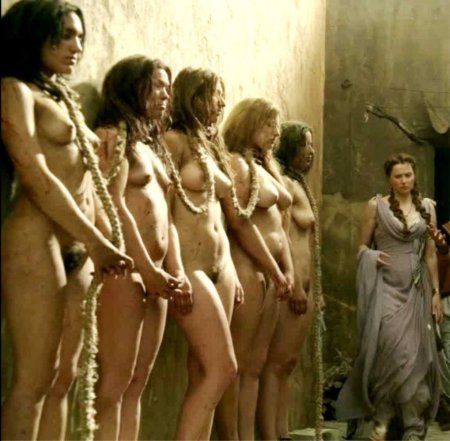 Naked women with slaves