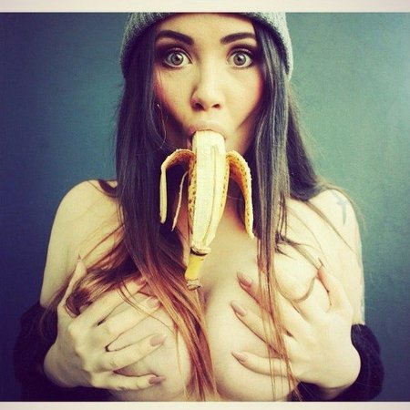 Girl sucks banana