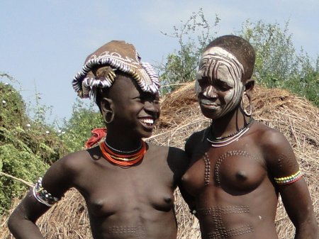 Naked whites in an African tribe