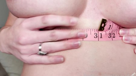 Girls measure their breasts