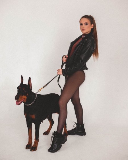 Nita with a Doberman photo shoot