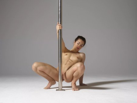 Naked girl on a pole