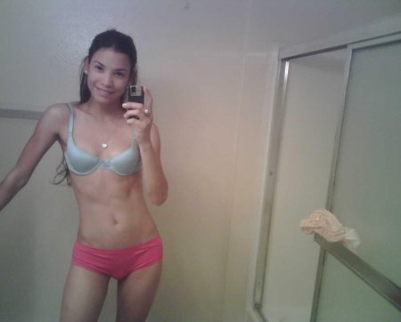 Naked in front of the mirror